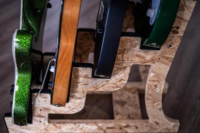 Wooden guitar rack: the ideal support to protect and enhance your guitars