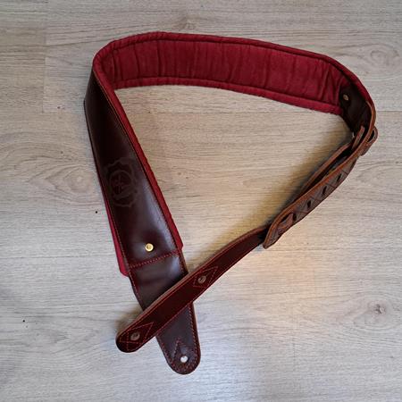 Ac­ces­soires pour Gui­tares & Basses 10/9 ème Musicwear - Sangle pour guitare/basse en cuir marron, rembourrée, doublée suédine rouge. - Sangles