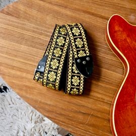 Ac­ces­soires pour Gui­tares & Basses Tom's Vintage Straps - Gold 'Crossroads' Guitar/Bass Hippie Strap - Sangles