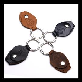 Ac­ces­soires pour Gui­tares & Basses Bourbon Strap Guitar - Llavero Pickguard - Sangles